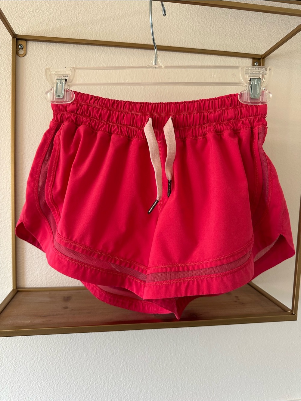 Lululemon Women's strawberry pink Athletic Shorts with Drawstring and liner.